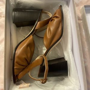 New with tags Jimmy Choo shoes! Size 7.5.